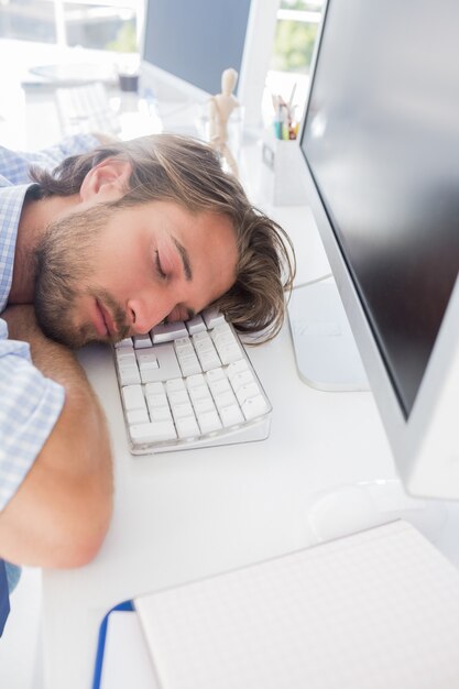 Man napping on his desk