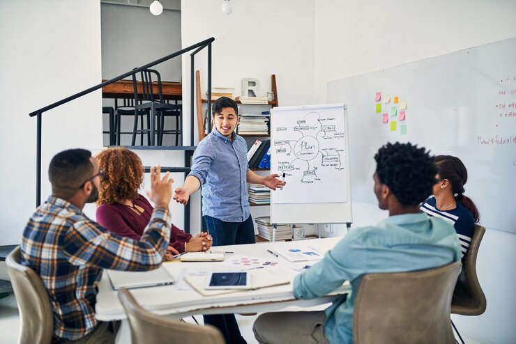 Photo man office and white board for meeting or presentation speaking and company growth and teaching for collaboration diversity coaching and project planning for start up strategy with presenter
