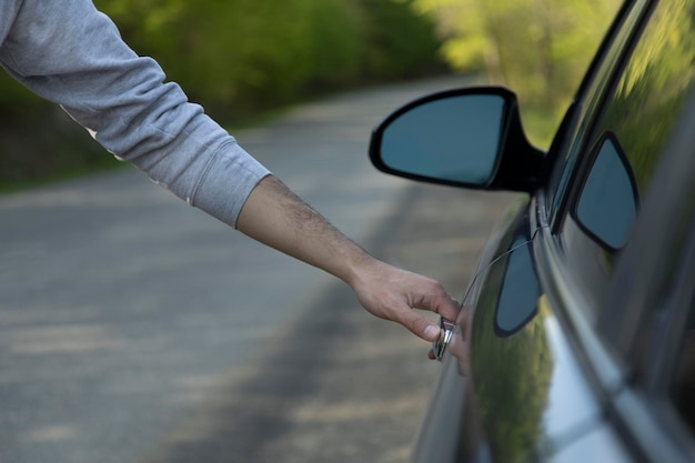 Man open car door