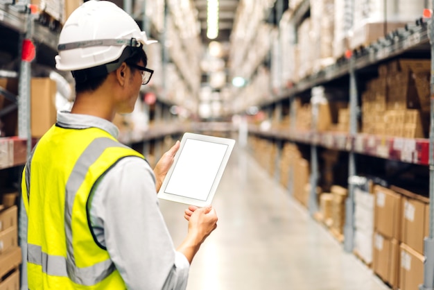 man order details checking goods and supplies on shelves