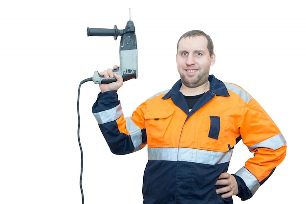 Man in overalls with a hammer