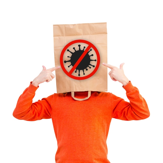 Man in paper bag on head to protect himself from covid-19 isolated on white background.