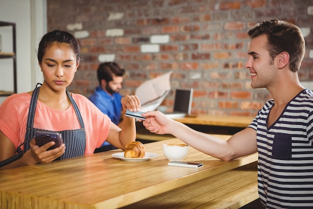 Man paying with his credit card