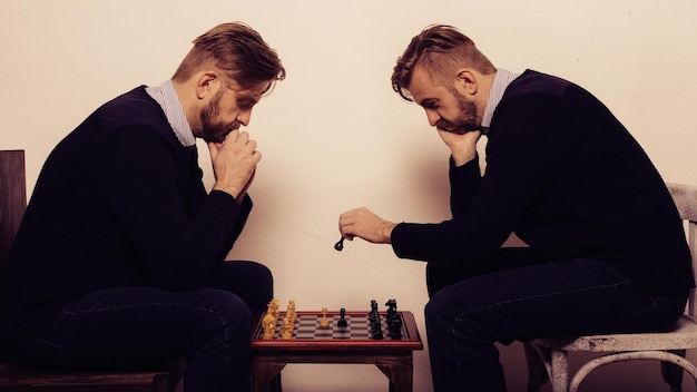 Man playing chess against himself