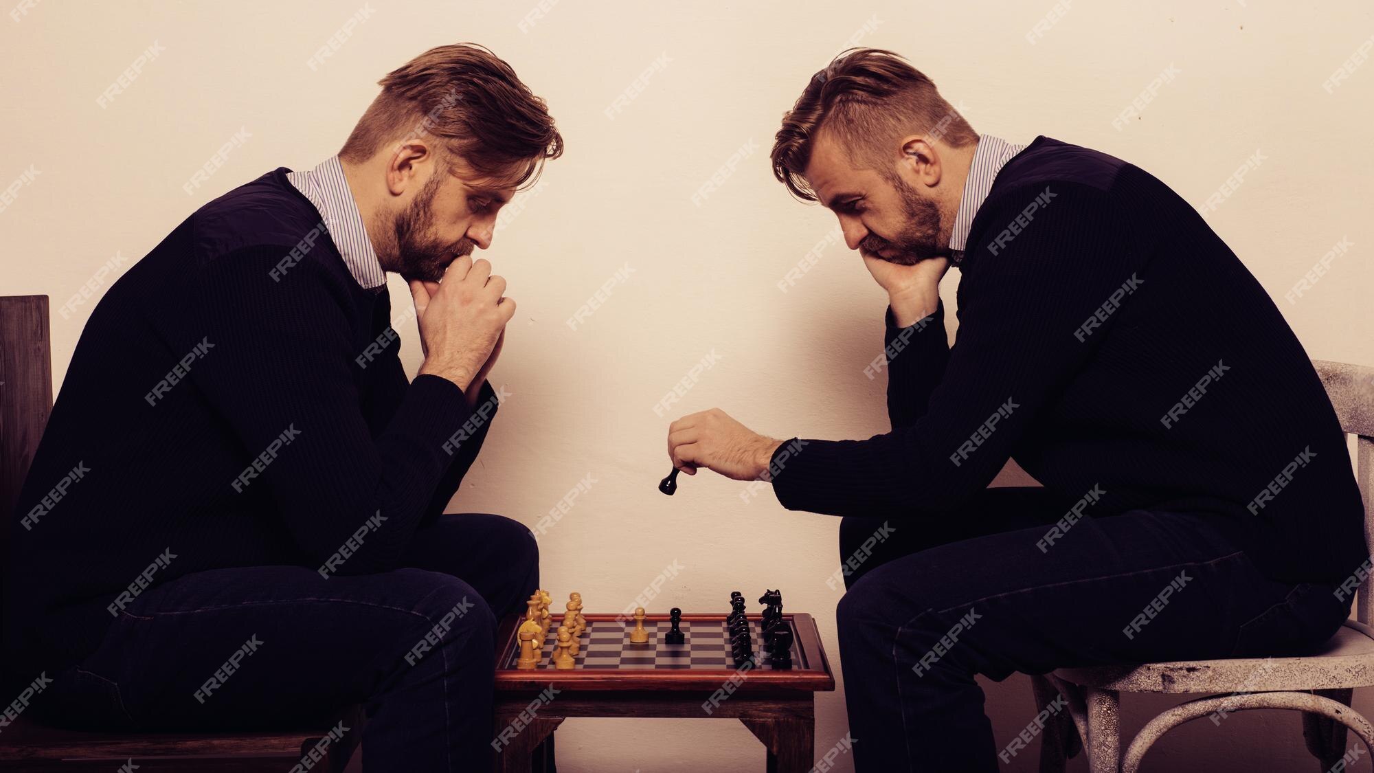 Premium Photo  Man playing chess against himself