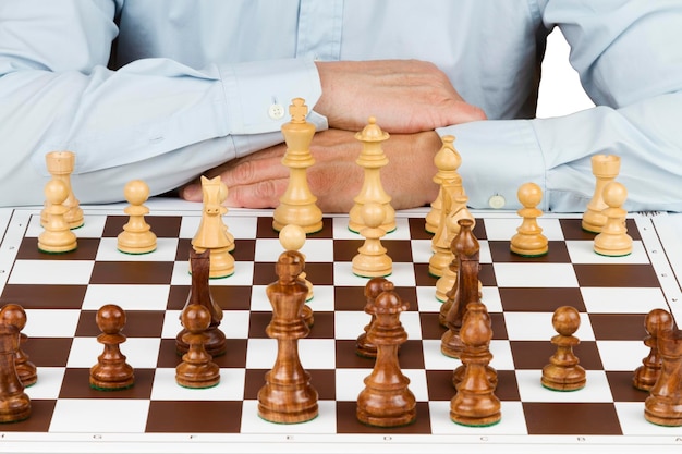 man playing chess board