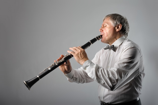 Man playing on a clarinet