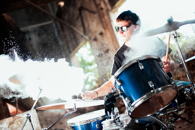 man playing drum