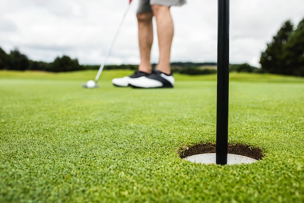 Man playing golf