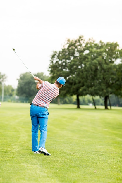 Man playing golf