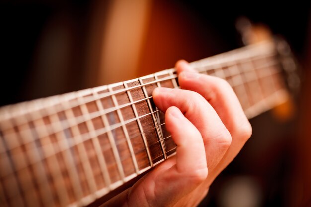 Man Playing Guitar on a Stage. Musical Concert