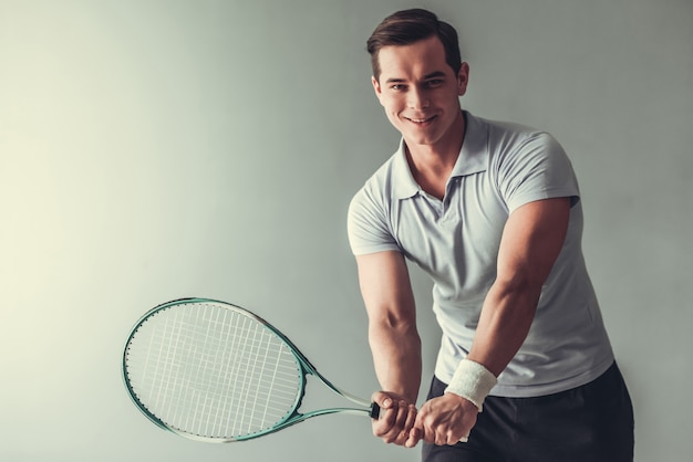 Photo man playing tennis