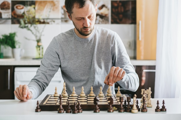 Premium Photo  Man playing chess against himself