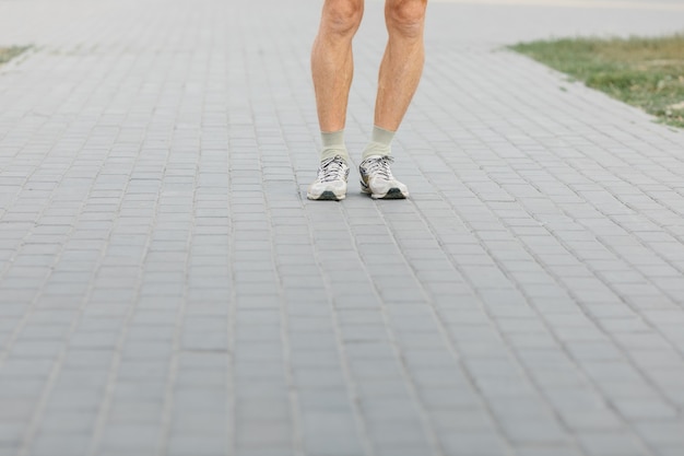 Man plays sports in the fresh air. High quality photo