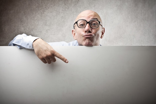 Man pointing on a board