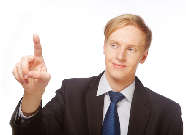Man pointing showing copy space isolated on white background. Caucasian young businessman.