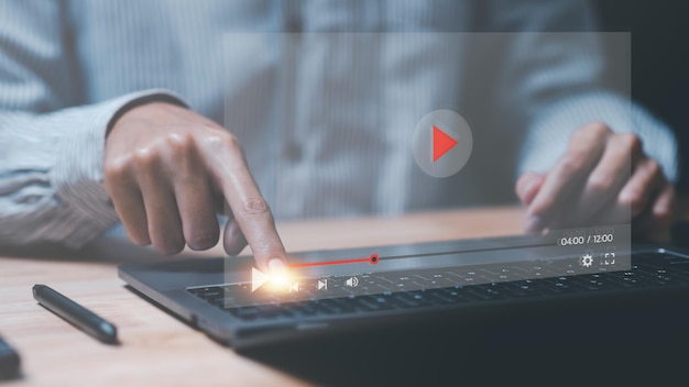 a man pointing at virtual reality iconto watch videos via wireless technologyTraining learning teachingvirtual reality used in online video conferencingOnline streaming Watch videos on Internet