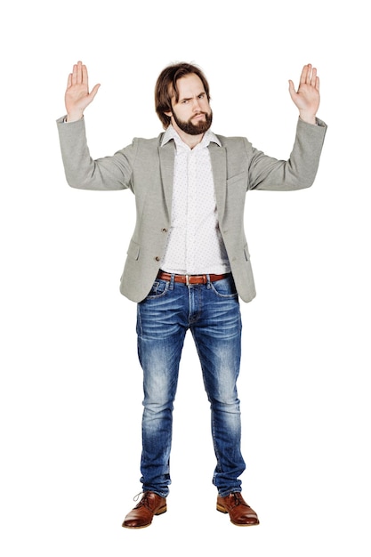 Man posing with hands up on white background human emotion expression and lifestyle concept image on a white studio background