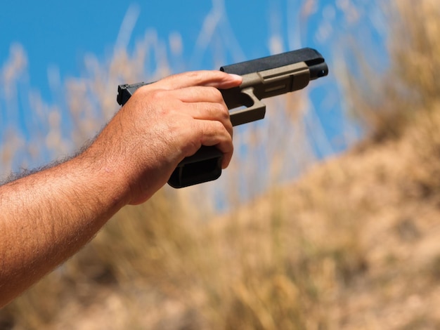 Man practicing target shooring.