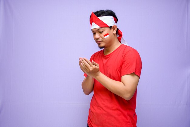 Man praying on indonesia independence day on 17 august