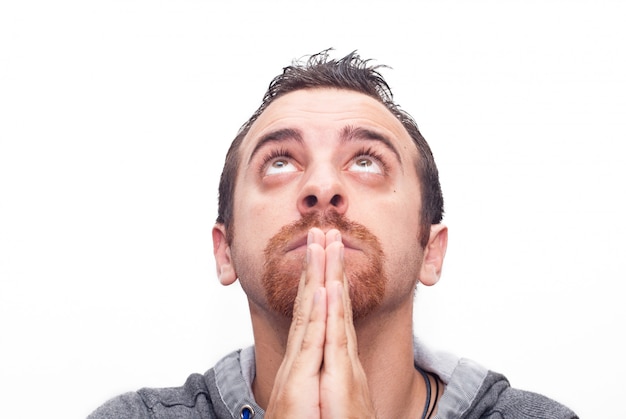 Man praying and looking up