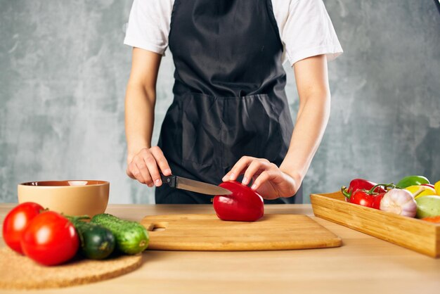 Man preparing food on cutting board