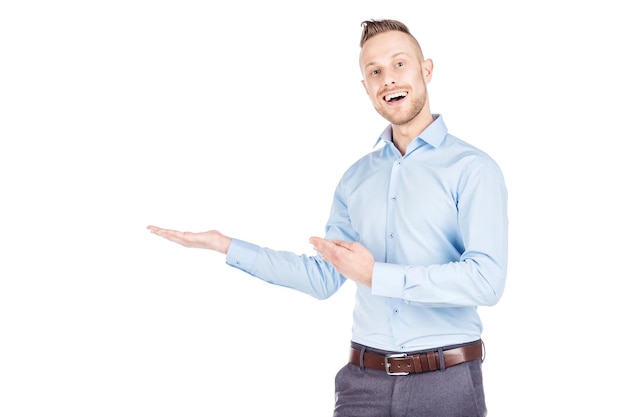 Man presenting or showing something your text or product human emotion expression and lifestyle concept image on a white studio background