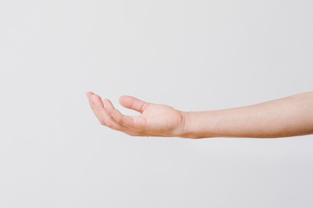 Man presenting thing on his palm