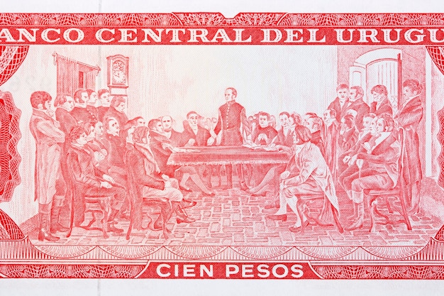 Man presiding at independence meeting from Uruguayan money