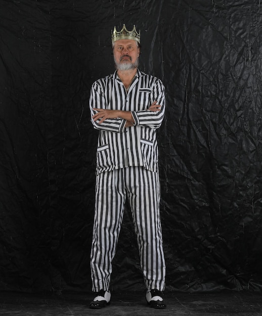 Photo man in prison striped clothes