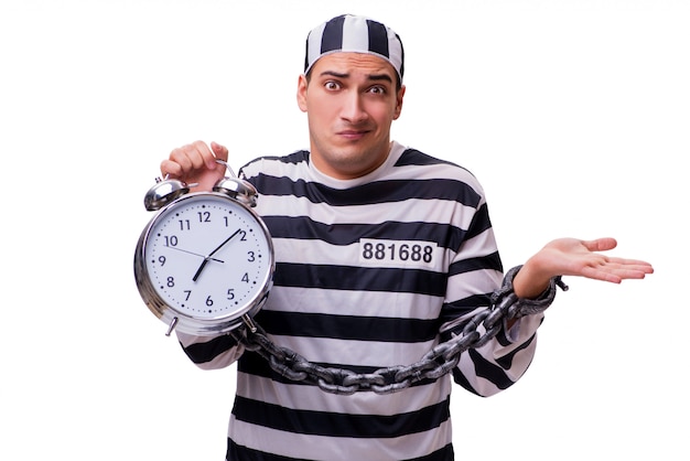 Man prisoner with clock isolated on white