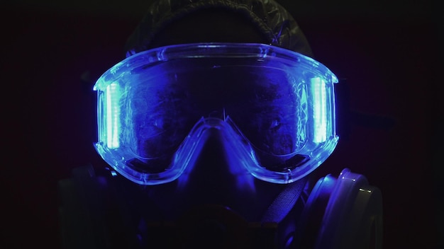 man in protective costume suit gas protect medical antibacterial antiviral spray paint mask doctor health worker in respirator concept health virus coronavirus epidemic radiation nuclear war