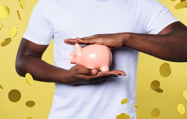 Man protects his piggy bank