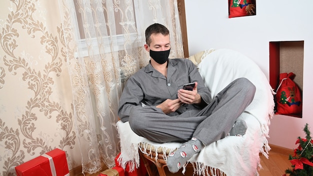 A man in quarantine at Christmas. High quality photo