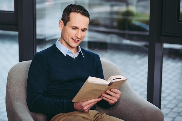 Man reading the book