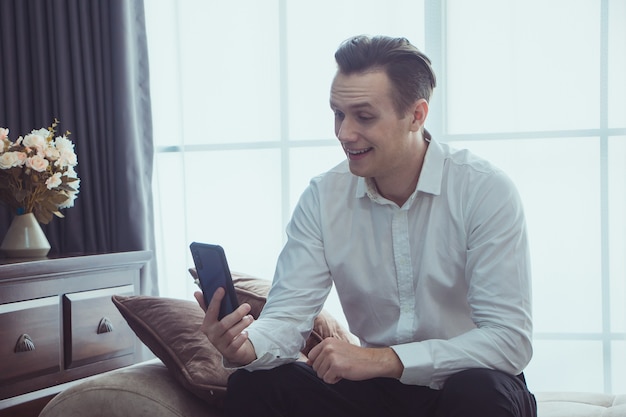 Man reading email on smartphone