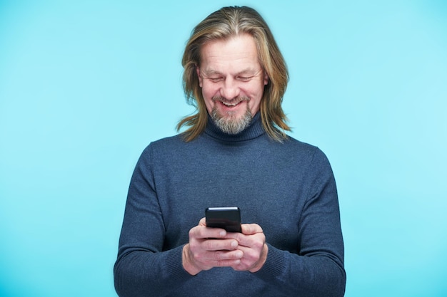 Man reading message on smartphone