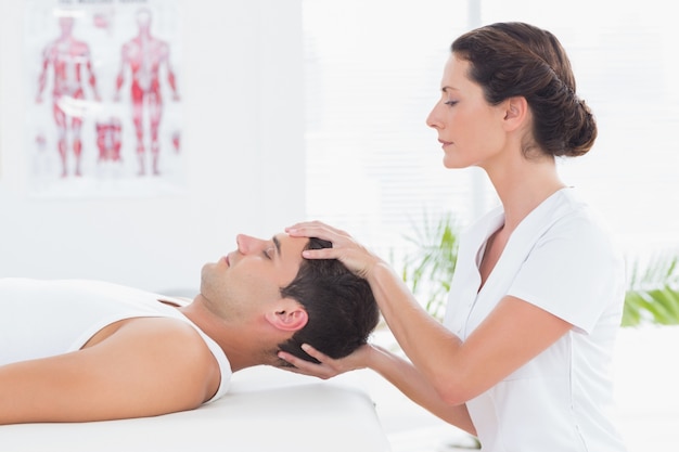 Man receiving head massage 