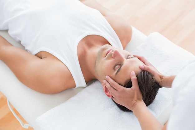 Man receiving head massage 