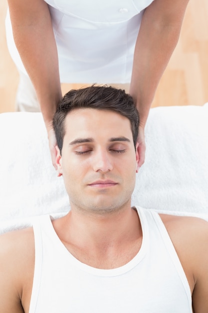 Man receiving neck massage 