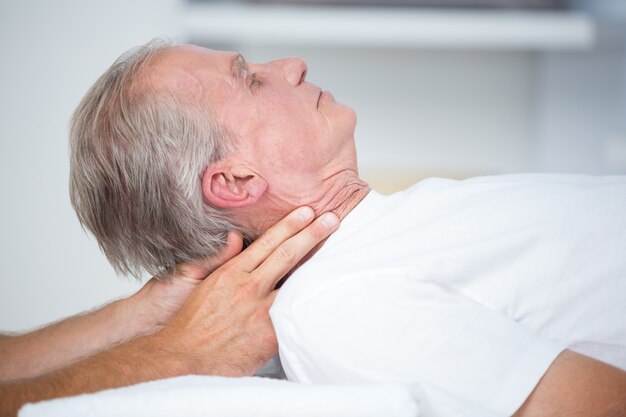 Man receiving neck massage 