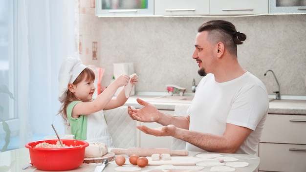 A man rejoices at the achievements of the child