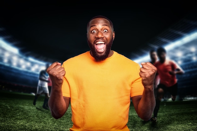 Man rejoices for the victory of his football team