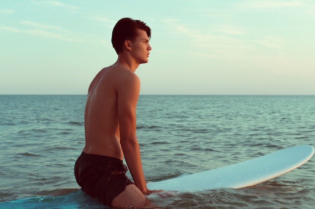 Man relaxing after surfing