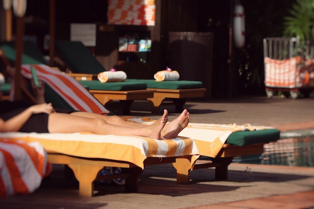 Man relaxing by the pool