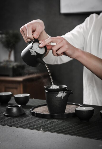 man relaxing home with tea