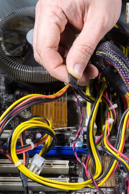 Man repairing a computer