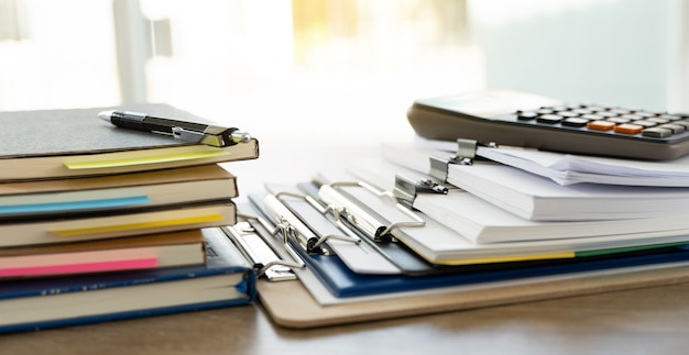 Man report stack paper folder close up stacking of office working document with paper legal paperwork on top