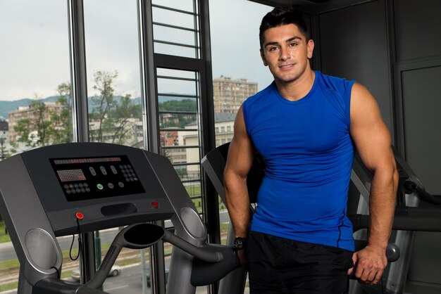 Man Resting After Exercises In Gym