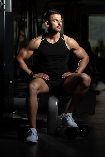 Man Rests In Gym After Having A Workout